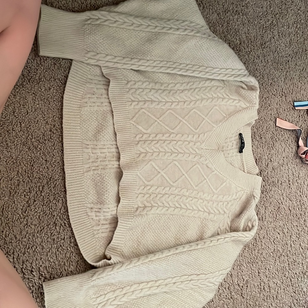 A beige sweater